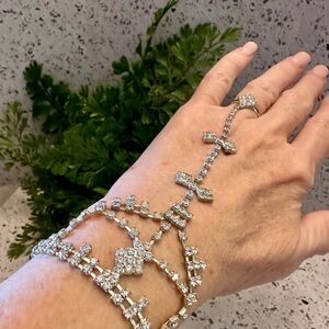 Rhinestone wristlet (bracelet to ring) in silver tone